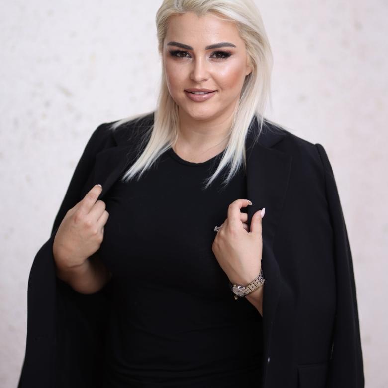 Migena Kola